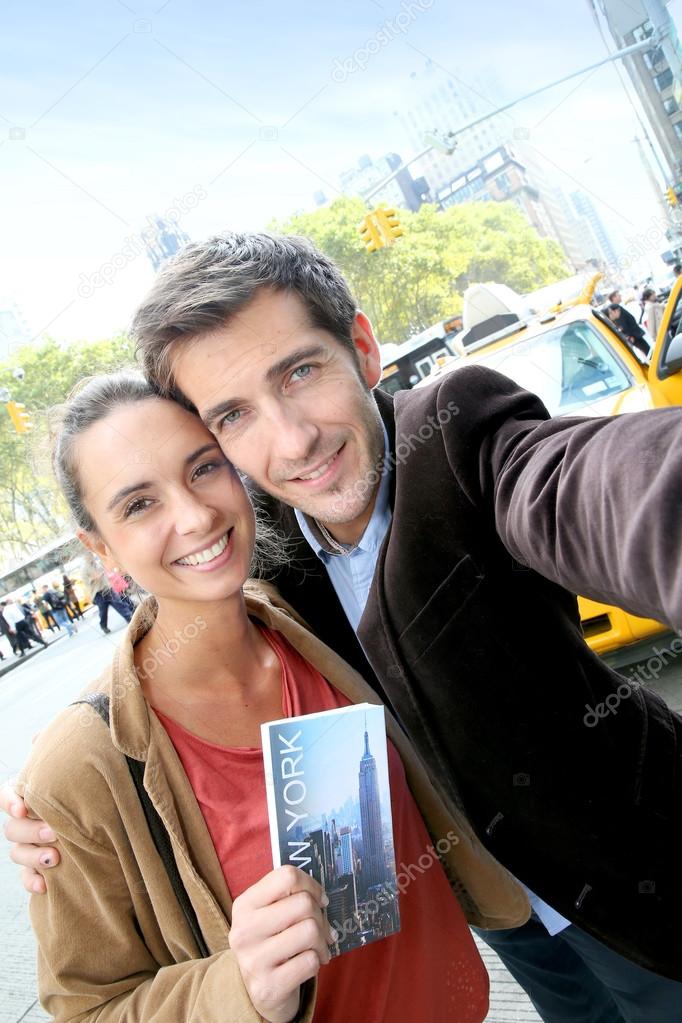 Couple in New York city taking picture