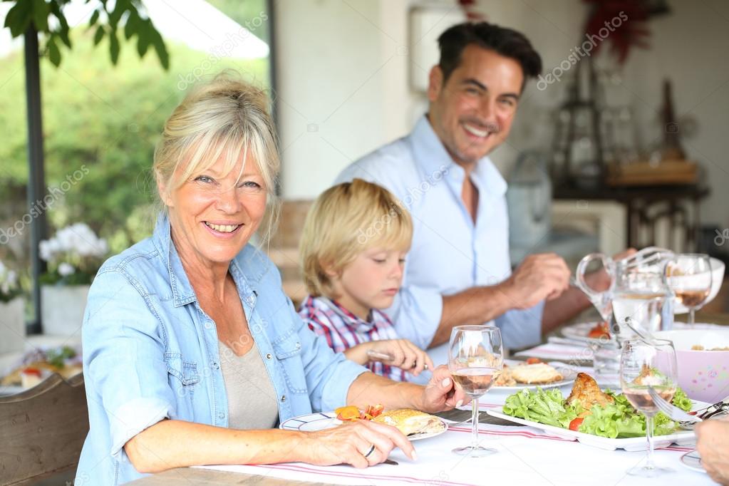 Family having summmer lunch