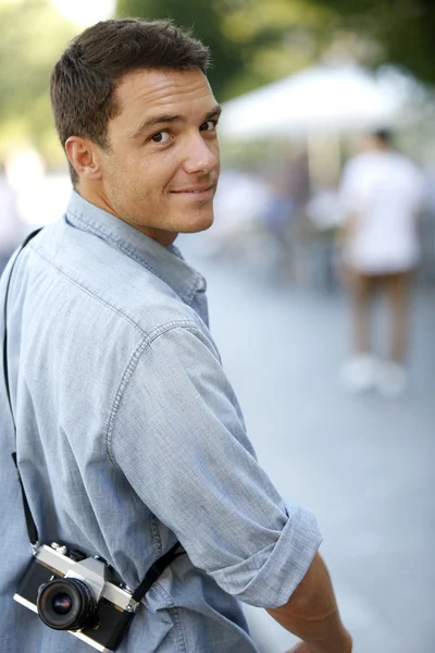 Man photographing with vintage camera — Stock Photo, Image