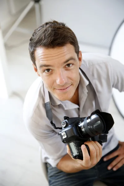 Photographer with lighting equipment — Stock Photo, Image