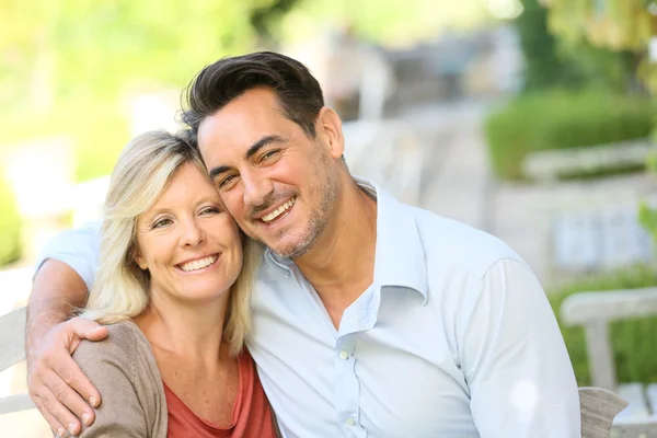 Loving mature couple on bench — Stock Photo, Image