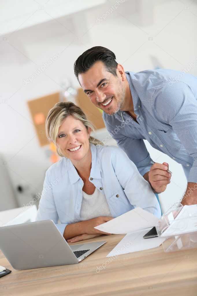 Business people working on laptop