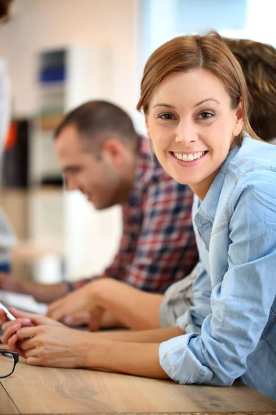 Student girl at home with roommates Royalty Free Stock Photos