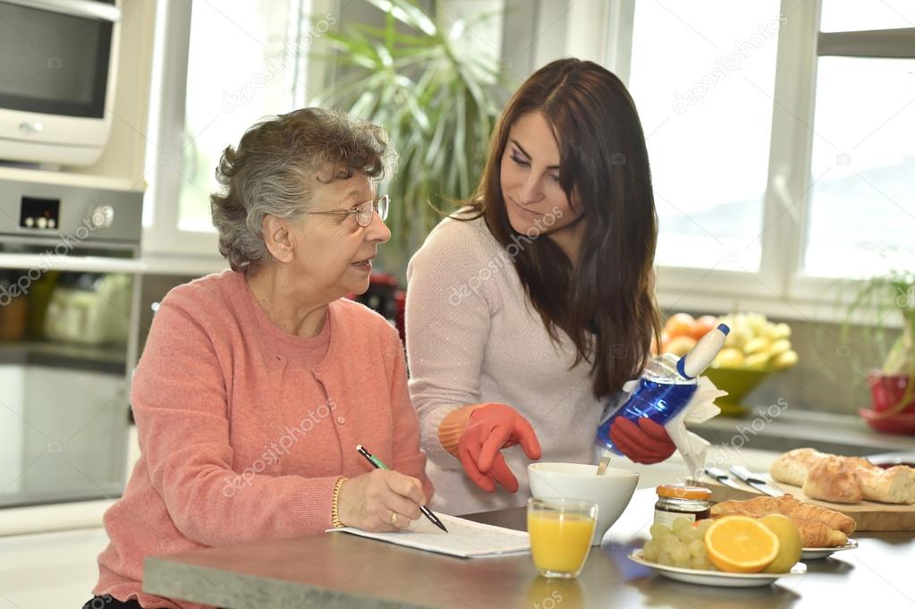 Elderly woman doing crossword