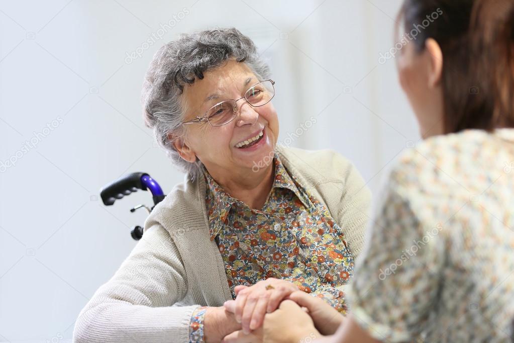 Elderly woman with home carer