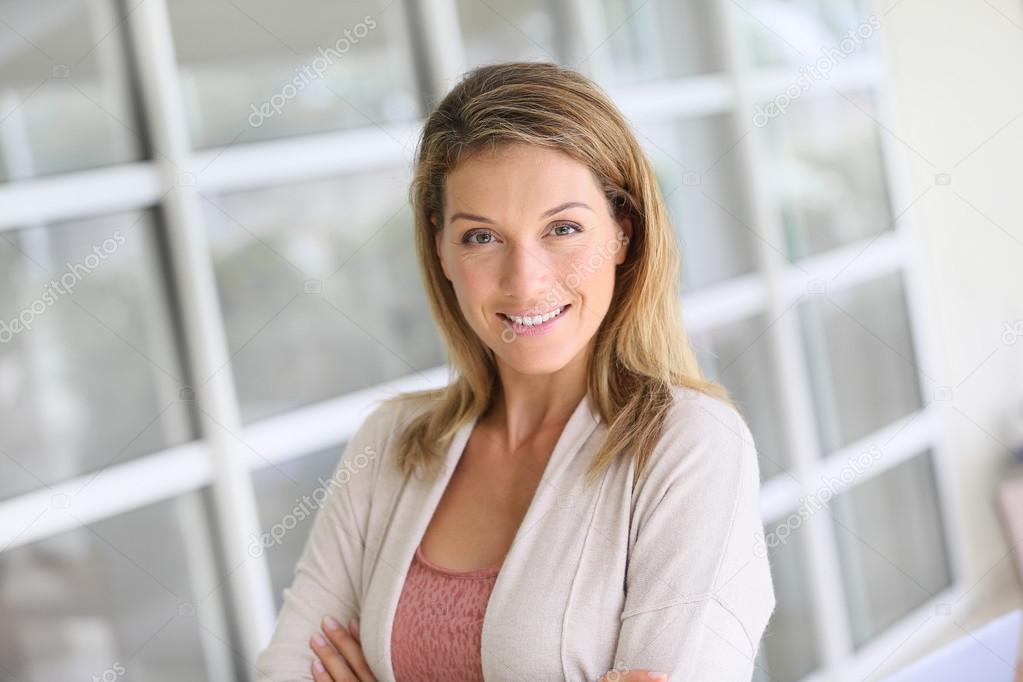 Business woman with crossed arms