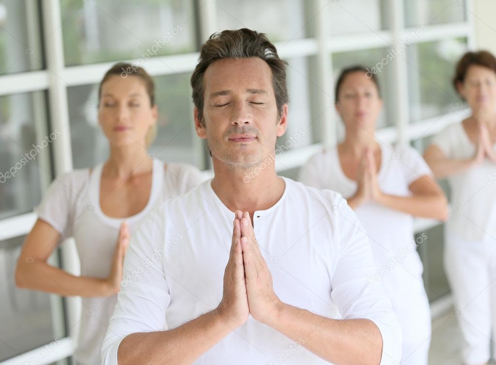 Man doing yoga exercises