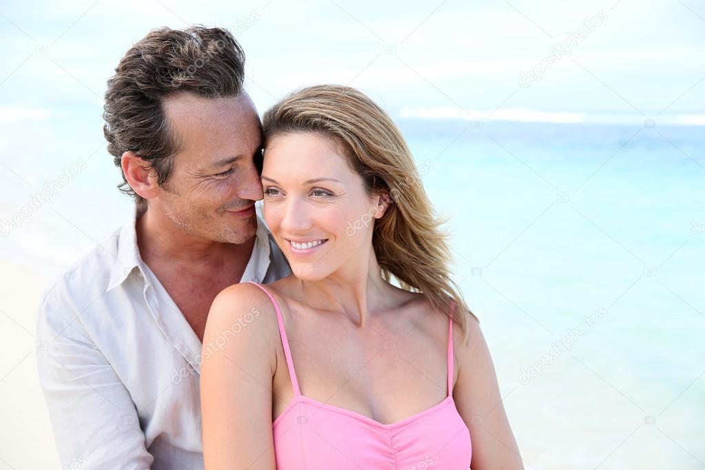 Middle-aged couple at beach