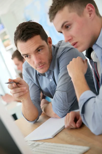 Teacher with student working — Stock Photo, Image