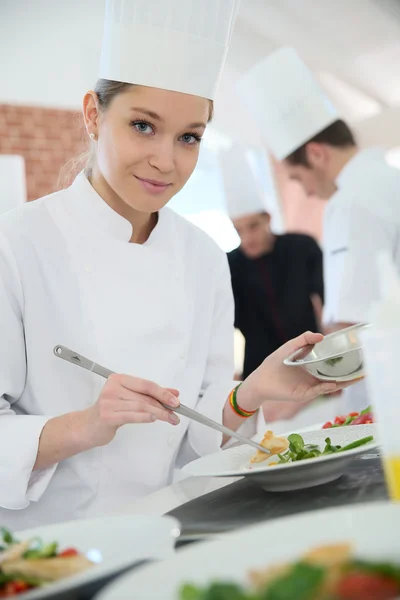 Girl preparing dish — Stock Photo, Image