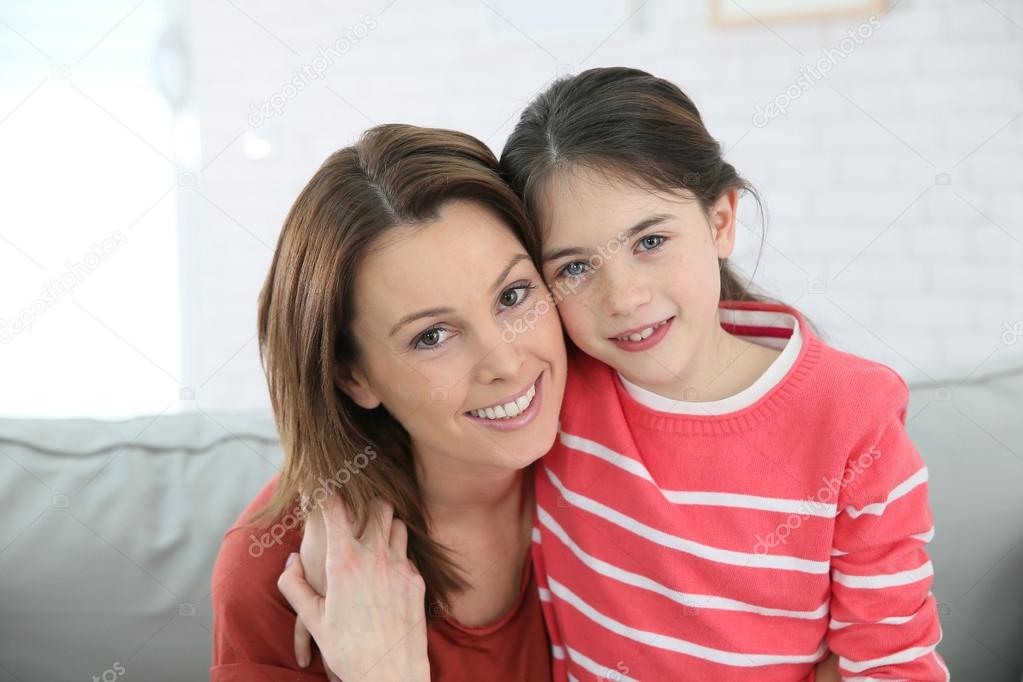 Mother and daughter with red shirts