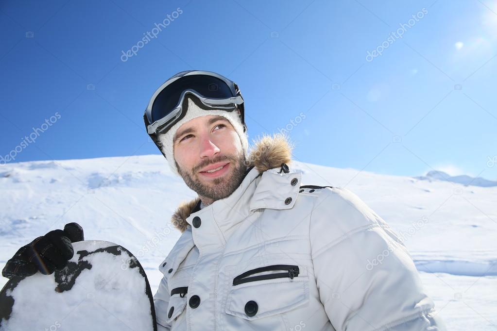 Snowboarder at ski slope