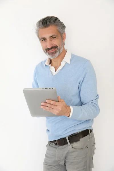 Man websurfing with tablet — Stock Photo, Image