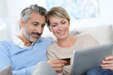 Couple e-shopping on internet