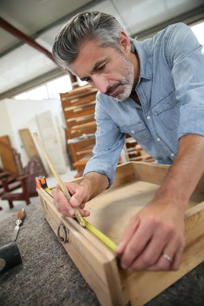 Carpenter measuring drawer — Stock Photo, Image