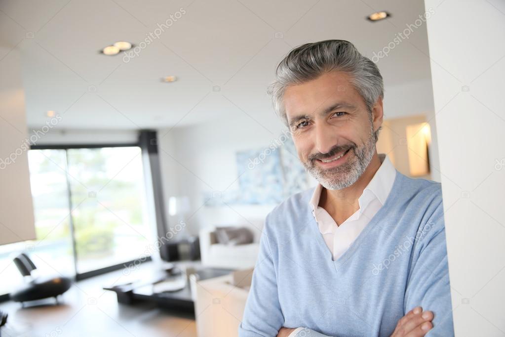 Man in contemporary house