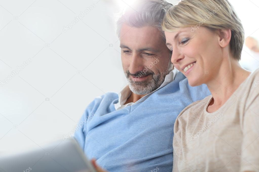 Couple websurfing on touchpad