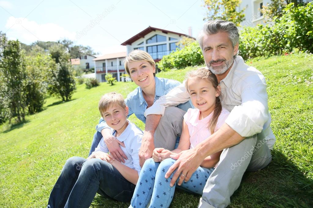 Family sitting in garden