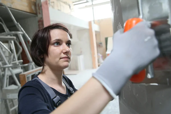 Plasterer working on indoor wall — Stock Photo, Image