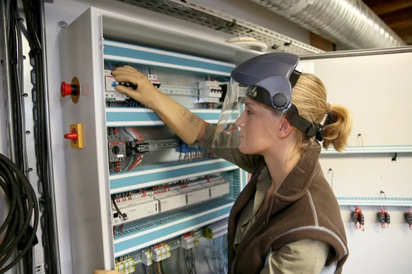 Oman checking electrical system — Stock Photo, Image