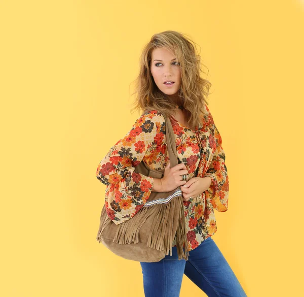 Beautiful trendy woman holding bag — Stock Photo, Image