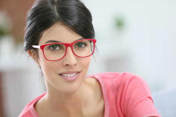 Girl wearing red eyeglasses — Stock Photo, Image