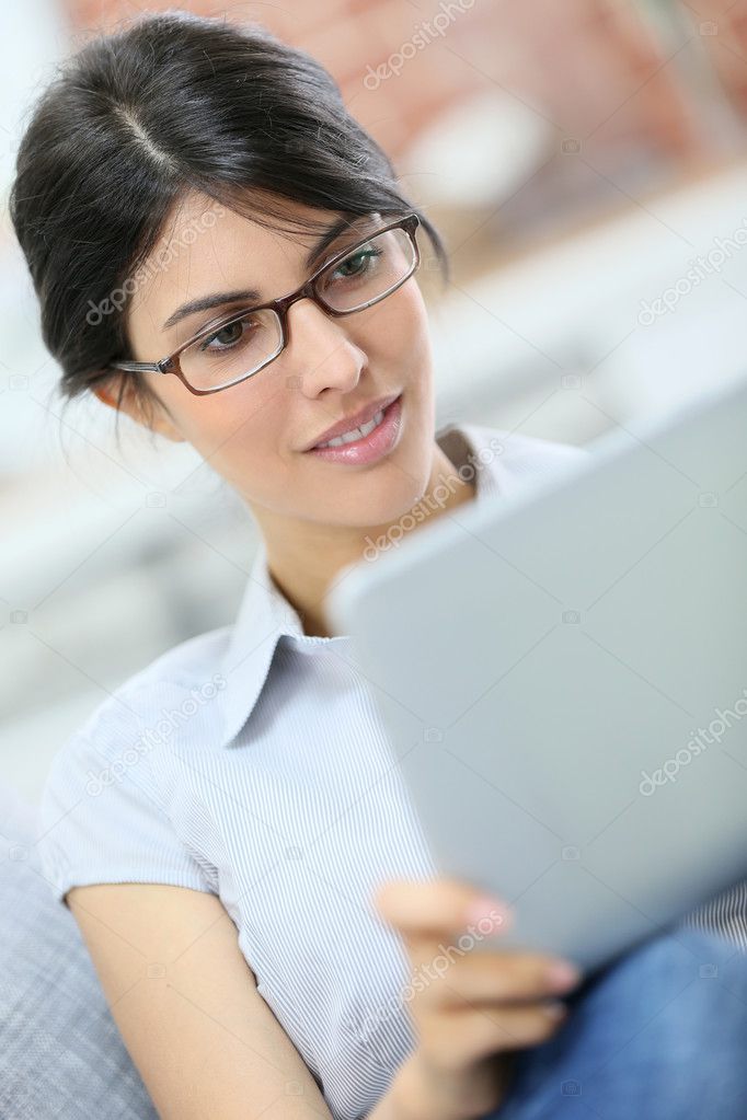 woman  using digital tablet