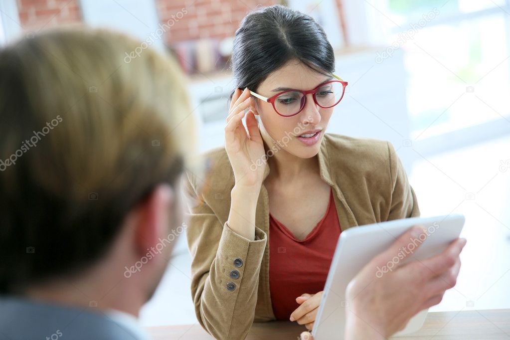 Woman choosing eyeglasses