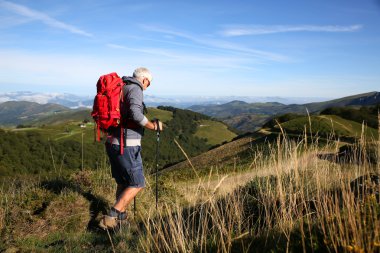 male Hiker on a journey clipart