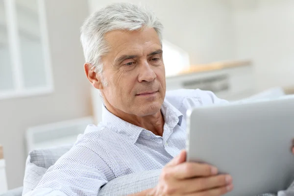 senior man  using digital tablet