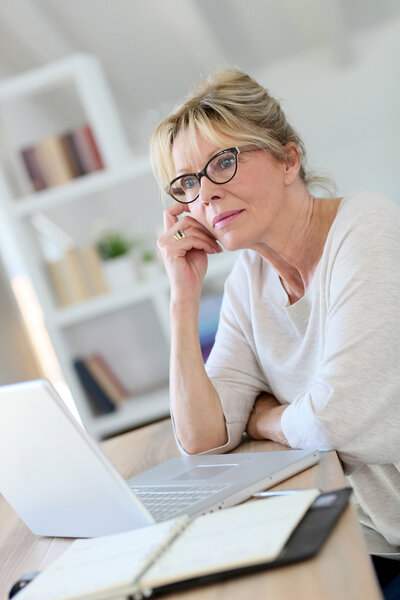 woman working on laptop computer