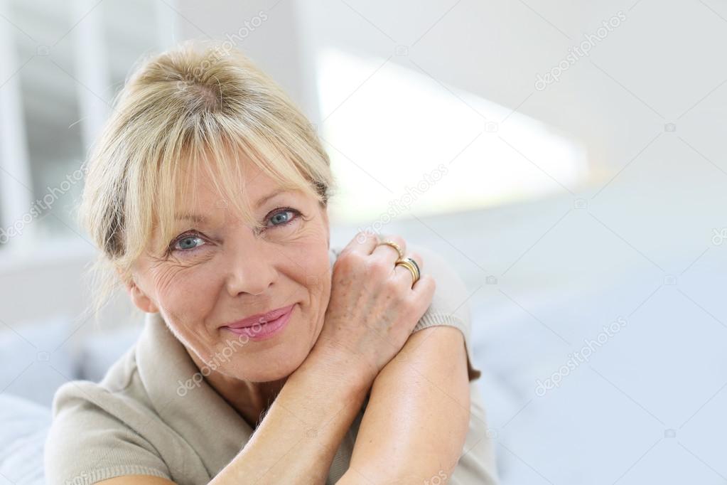 woman relaxing on  couch