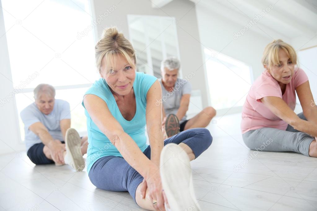 people doing stretching exercises