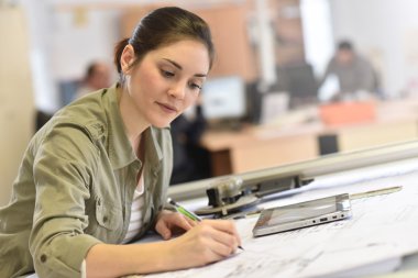 architect working on drawing table clipart