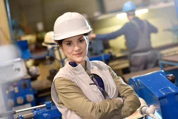 Metal worker standing in workshop — Stock Photo, Image