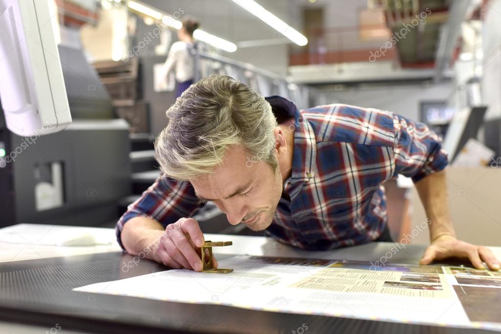 Man working  in print factory