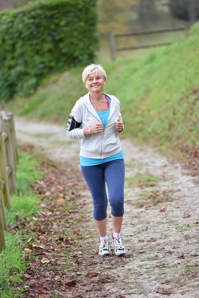 Senior jogging mulher — Fotografia de Stock