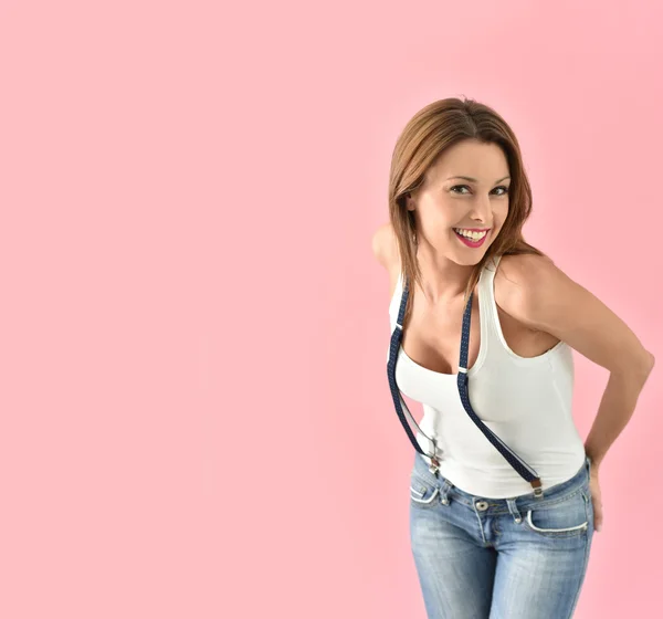 Girl with suspenders posing — Stock Photo, Image