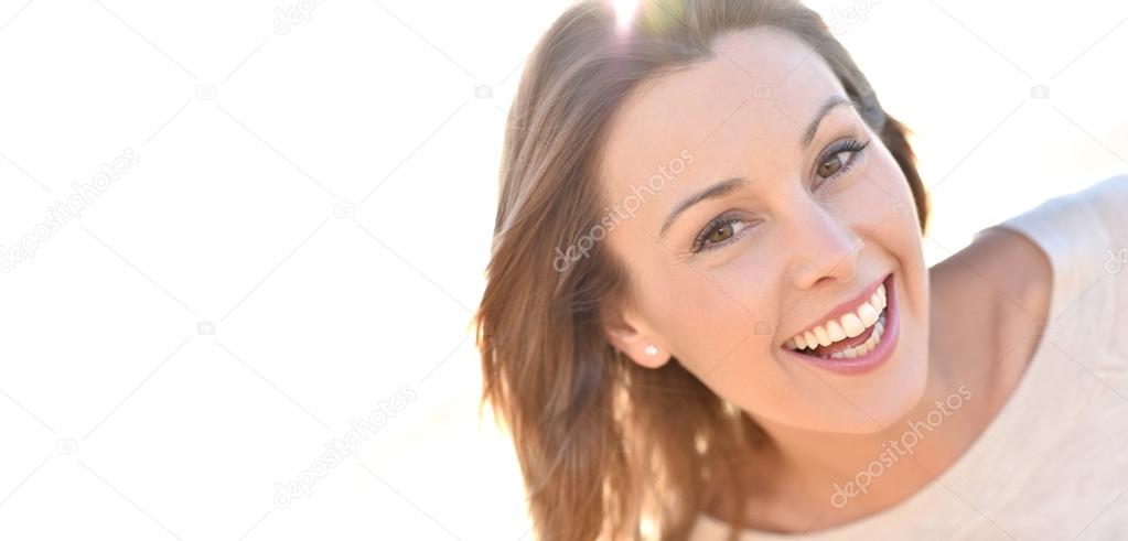 cheerful natural woman smiling