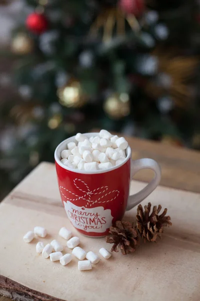 Christmas drink with marshmallow on a wooden table at home — Stock Photo, Image