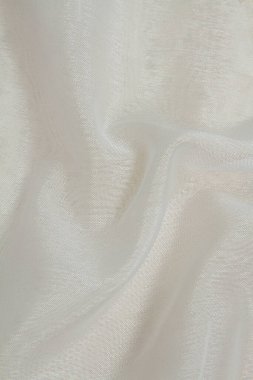 Buruşuk kumaş arka plan, hafif havadar, şeffaf kumaş dokusu. Tasarım için kumaş arkaplanı.