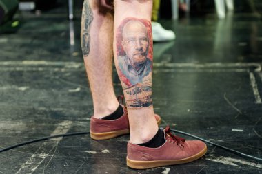 MINSK, BELARUS - SEPTEMBER 19, 2015: People show their tattoos f