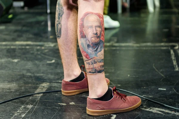 MINSK, BELARUS - SEPTEMBER 19, 2015: People show their tattoos f Stock Fotó