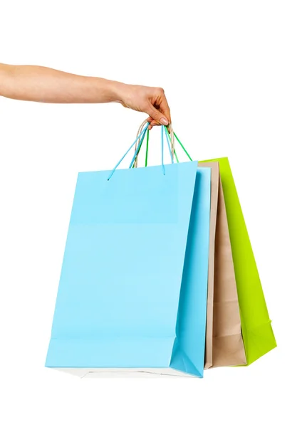 Closeup of womans hand with shopping bags. — Stock Photo, Image