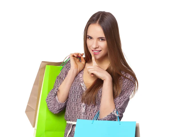 Mulher bonita feliz com sacos de compras isolados no branco . — Fotografia de Stock