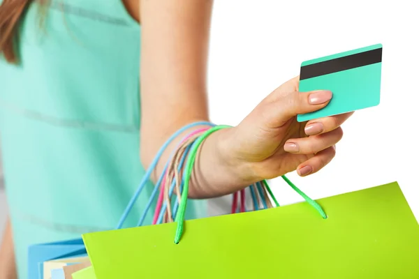 Primer plano de la mano de las mujeres con bolsas de compras y tarjeta de crédito . —  Fotos de Stock