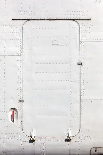 Ancienne porte d'avion peinte en blanc . — Photo