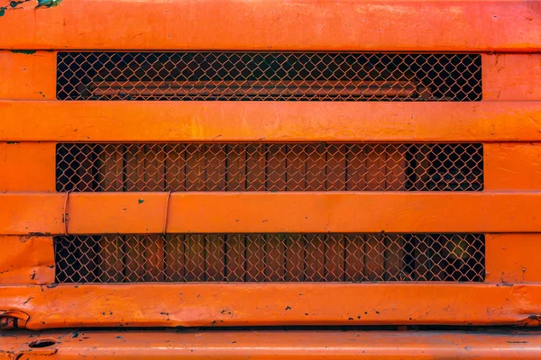 Old orange truck grille. — Stock Photo, Image