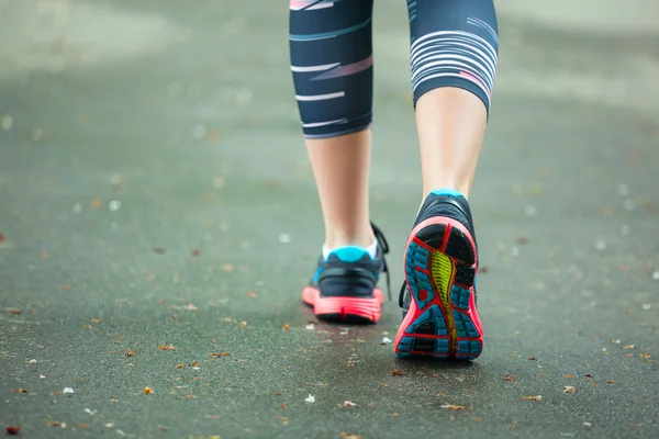 Close up of running shoes on road. — Stock Photo, Image