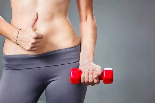 Primo piano della giovane donna magra con busto a sei busti . — Foto Stock